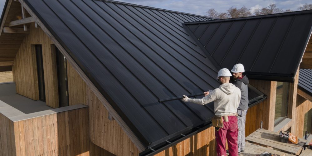 full-shot-roofers-working-together-with-helmets
